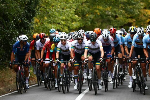 Michael Matthews between two of his Australian teammates at a home Road World Championships in Wollongong in 2022