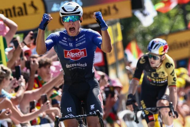 AlpecinDeceunincks Belgian rider Jasper Philipsen celebrates as he cycles ahead of JumboVismas Belgian rider Wout Van Aert R to the finish line to win the 3rd stage of the 110th edition of the Tour de France cycling race 1935 km between AmorebietaEtxano in Northern Spain and Bayonne in southwestern France on July 3 2023 Photo by AnneChristine POUJOULAT AFP Photo by ANNECHRISTINE POUJOULATAFP via Getty Images