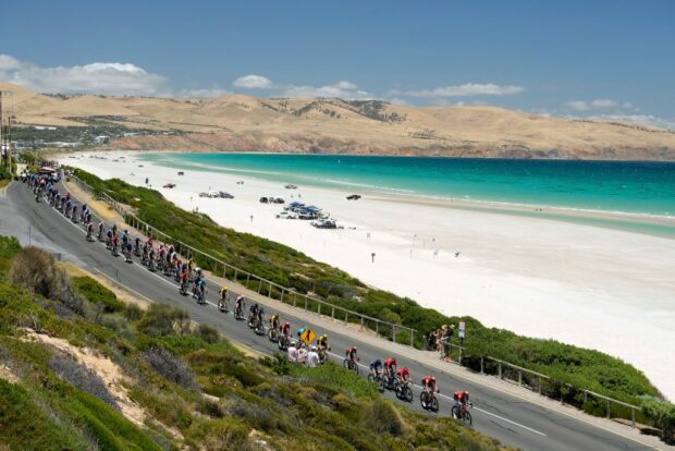 The peloton passes by Aldinga beach during the 2023 Tour Down Under men