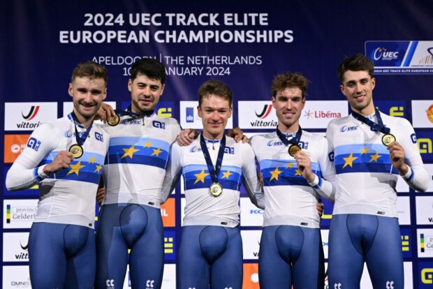 Daniel Bigham, Charlie Tanfield, Ethan Hayter, Oliver Wood, Ethan Vernon celebrate with gold medals on the podium for the Men