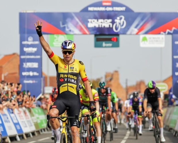 Picture by Alex Whitehead/SWpix.com - 06/09/2023 - Cycling - 2023 Tour of Britain - Stage 4: Sherwood Forest to Newark-on-Trent (166.6km) - Wout van Aert of Team Jumbo Visma Celebrating his teammates (Olav Kooij) fourth consecutive stage of the 2023 Tour of Britain at Stage 4 in Newark-on-Trent