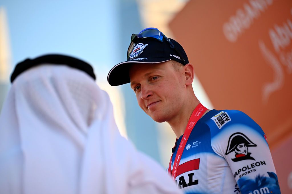 DUBAI HARBOUR DUBAI UNITED ARAB EMIRATES FEBRUARY 22 Tim Merlier of Belgium and Team SoudalQuick Step celebrates at podium as stage winner during the 6th UAE Tour 2024 Stage 4 a 168km stage from Dubai Police Officers Club to Dubai Harbour UCIWT on February 22 2024 in Dubai United Arab Emirates Photo by Tim de WaeleGetty Images