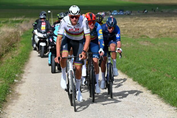 WEVELGEM BELGIUM MARCH 24 LR Mathieu van der Poel of The Netherlands and Team Alpecin Deceuninck Mads Pedersen of Denmark and Team Lidl Trek and Laurence Pithie of New Zealand and Team Groupama FDJ compete in the breakaway passing through the Plugstreets during the 86th GentWevelgem in Flanders Fields 2024 Mens Elite a 2531km one day race from Ieper to Wevelgem UCIWT on March 24 2024 in Wevelgem Belgium Photo by Tim de WaeleGetty Images