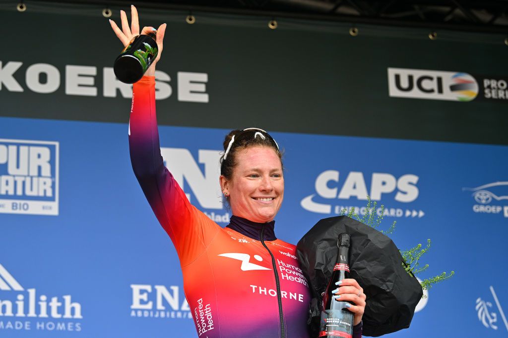 NOKERE BELGIUM MARCH 13 Lily Williams of The United States and Team Human Powered Health celebrates at podium as third place winner during the 5th Danilith Nokere Koerse 2024 Womens Elite a 127km one day race from Deinze to Nokere UCIWWT on March 13 2024 in Nokere Belgium Photo by Luc ClaessenGetty Images