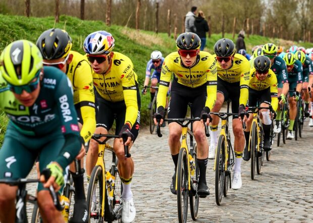 Belgian Tiesj Benoot of Team Visma-Lease a Bike (2L), Belgian Wout Van Aert of Team Visma-Lease a Bike (3L) and US Matteo Jorgenson of Team Visma-Lease a Bike (C) compete in the men elite