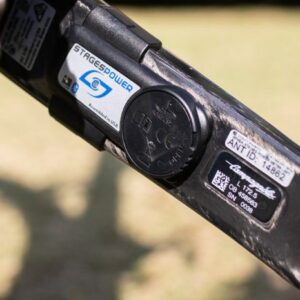 A closeup of the Stages crank power meter on a bike