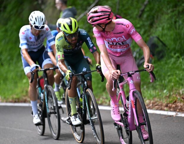 BASSANO DEL GRAPPA, ITALY - MAY 25: (L-R) Antonio Tiberi of Italy and Team Bahrain - Victorious - White best young jersey, Daniel Martinez of Colombia and Team BORA - hansgrohe and Tadej Pogacar of Slovenia and UAE Team Emirates - Pink Leader Jersey compete during the 107th Giro d