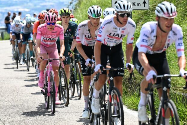 Tadej Pogačar follows his UAE Team Emirates teammates during the Giro d