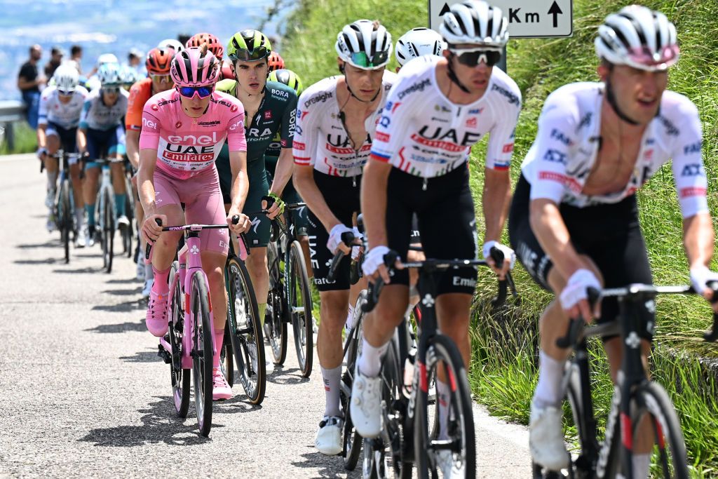 Tadej Pogačar follows his UAE Team Emirates teammates during the Giro d