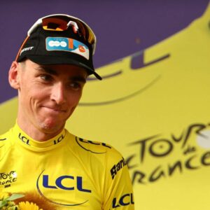 Romain Bardet enjoys the first yellow jersey of his career after winning stage 1 of the 2024 Tour de France in Rimini
