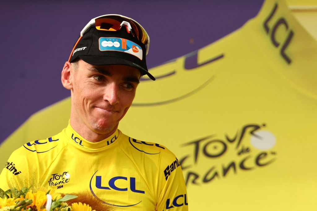 Romain Bardet enjoys the first yellow jersey of his career after winning stage 1 of the 2024 Tour de France in Rimini