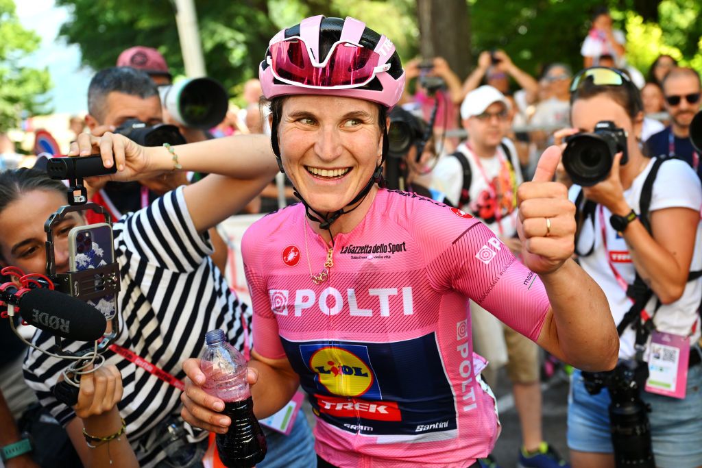 Elisa Longo Borghini celebrates winning the overall title at the Giro d