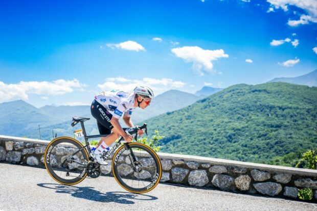 Remco Evenepoel racing through the Pyrenees during stage 15 of the 2024 Tour de France