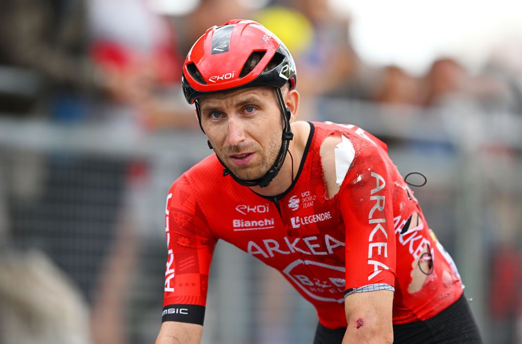 Amaury Capiot crosses the finish line injured after being involved in a crash during stage 14 at the Tour de France