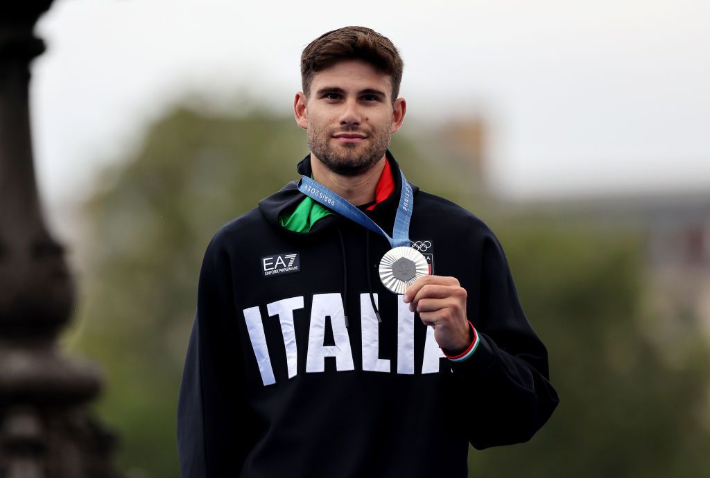 PARIS FRANCE JULY 27 Silver medalist Filippo Ganna of Team Italy poses on the podium at the Pont Alexandre III during the Mens Individual Time Trial on day one of the Olympic Games Paris 2024 at Pont Alexandre III on July 27 2024 in Paris France Photo by Tim de WaeleGetty Images