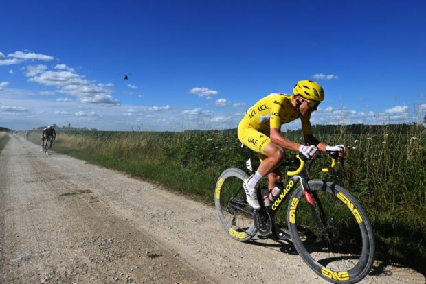 Tadej Pogačar (UAE Team Emirates) attacks on a gravel sector