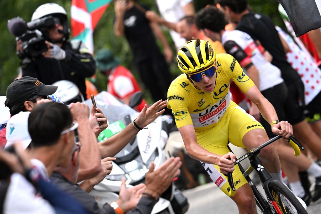 SAINTLARYSOULAN PLA DADET FRANCE JULY 13 Tadej Pogacar of Slovenia and UAE Team Emirates Yellow Leader Jersey attacks in the breakaway during the 111th Tour de France 2024 Stage 14 a 1519km stage from Pau to SaintLarySoulan Pla dAdet 1653m UCIWT on July 13 2024 in SaintLarySoulan Pla dAdet France Photo by Bernard Papon PoolGetty Images