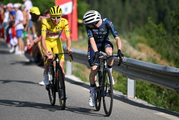 COL DE LA COUILLOLE FRANCE JULY 20 LR Tadej Pogacar of Slovenia and UAE Team Emirates Yellow Leader Jersey and Jonas Vingegaard Hansen of Denmark and Team Visma Lease a Bike compete in the chase group during the 111th Tour de France 2024 Stage 20 a 1328km stage from Nice to Col de la Couillole 1676m UCIWT on July 20 2024 in Col de la Couillole France Photo by Dario BelingheriGetty Images