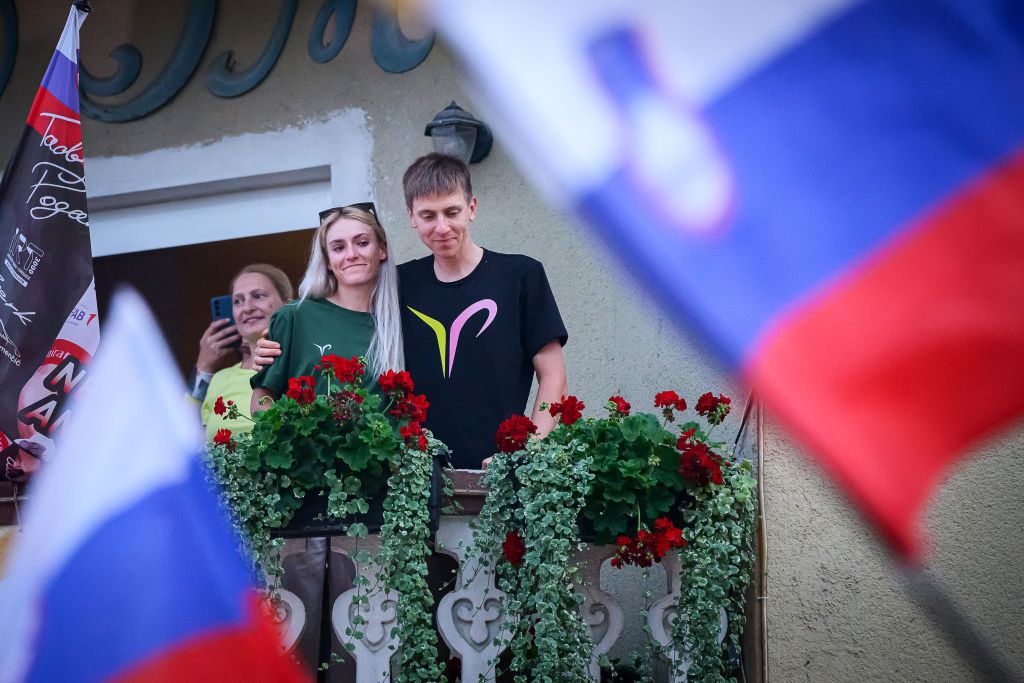 Tadej Pogačar and Urška Zigart at a celebration of his Giro d