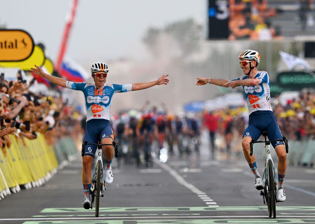 Tour de France: Frank van den Broek of Netherlands and stage winner Romain Bardet of France and Team dsmfirmenich PostNL celebrate at finish line during the 111th Tour de France 2024 Stage 1 a 206km stage from Firenze to Rimini UCIWT on June 29 2024 in Rimini Italy Photo by Dario BelingheriGetty Images