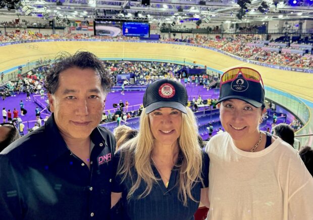 Alex Kim, Nicola Cranmer and Cathy Fegan-Kim meet at the Paris Olympic Games velodrome to confirm 2025 collaboration