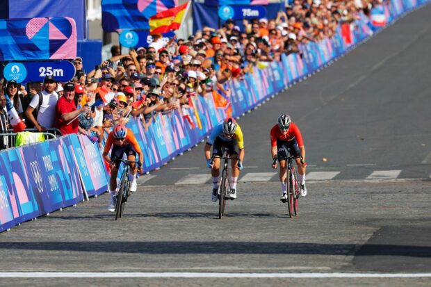 Picture by Alex Whitehead/SWpix.com - 04/08/2024 - Paris 2024 Olympic Games - Cycling Road - Trocadero-Trocadero (158.0km) - Paris, France - Womenâs Road Race - Marianne Vos (Netherlands) sprints to second place with Lotte Kopecky (Belgium) finishing third and Blanka Vas (Hungary) in fourth