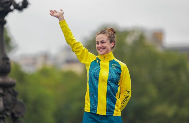 Picture by Alex Whitehead/SWpix.com - 27/07/2024 - Paris 2024 Olympic Games - Cycling Road - Womenâs Individual Time Trial (ITT) (32.4km) - Invalides to Pont Alexandre III, Paris, France - Grace Brown (Australia) receiving the gold medal after winning the Womenâs Individual Time Trial to become Olympic Champion