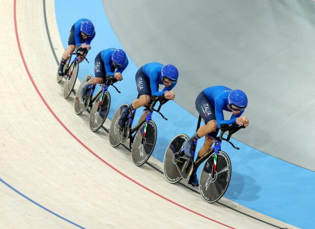 PARIS, FRANCE - AUGUST 06: Simone Consonni, Filippo Ganna, Francesco Lamon and Jonathan Milan of Team Italy compete during the Men