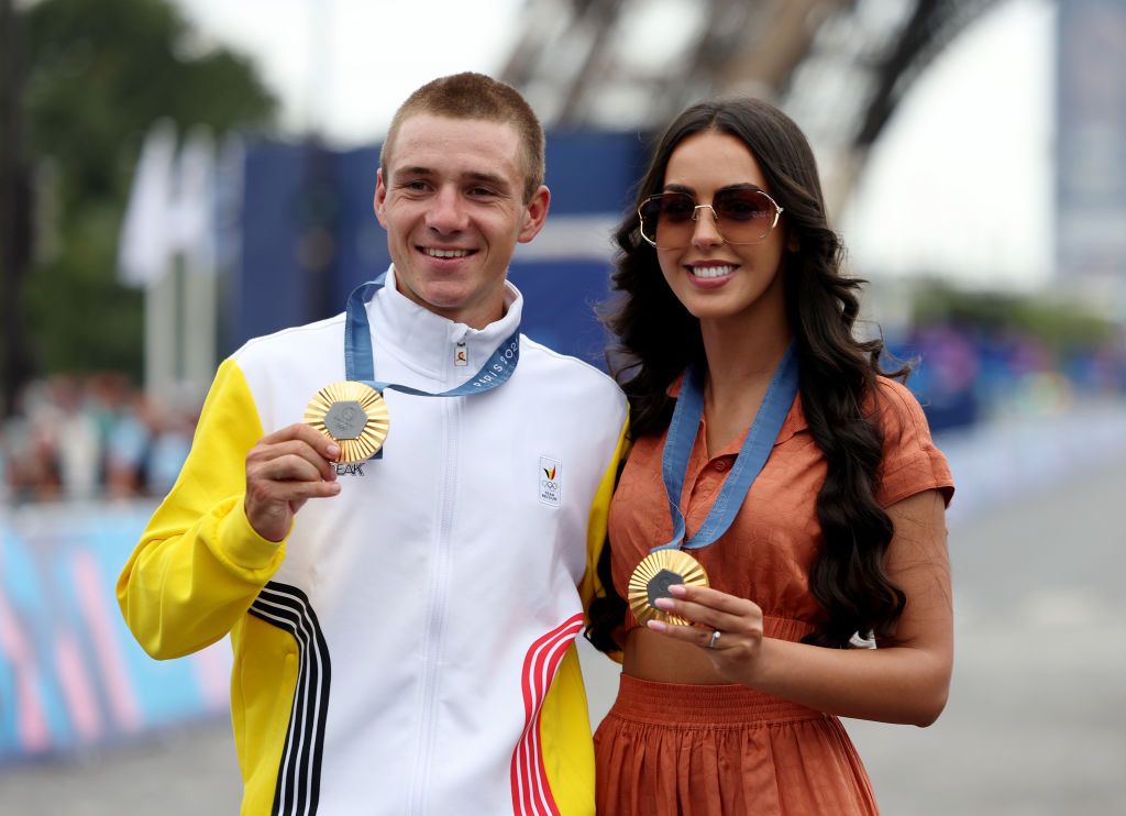 Remco Evenepoel shows off hid two Paris Olympic Games gold medals with his wife Oumi