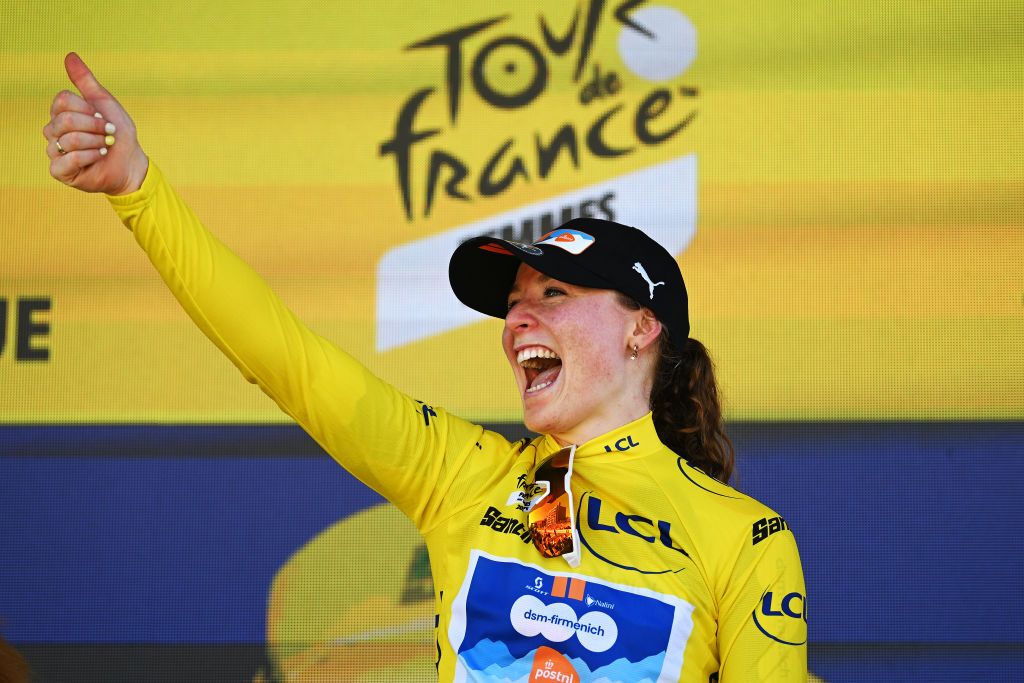 THE HAGUE NETHERLANDS AUGUST 12 Charlotte Kool of The Netherlands and Team dsmfirmenich PostNL celebrates at podium as Yellow leader jersey winner during the 3rd Tour de France Femmes 2024 Stage 1 a 123km stage from Rotterdam to The Hague UCIWWT on August 12 2024 in The Hague Netherlands Photo by Dario BelingheriGetty Images