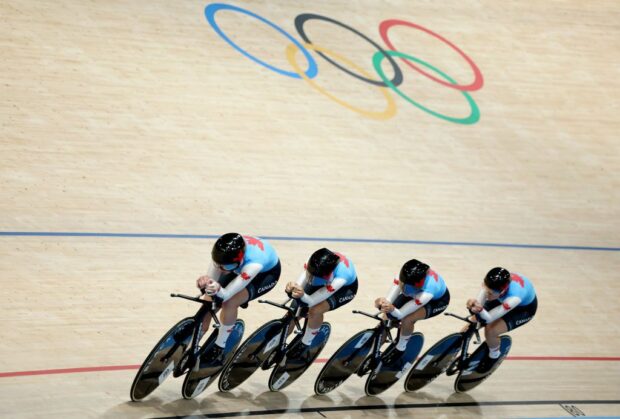 Maggie ColesLyster, Sarah van Dam, Erin Attwell and Ariane Bonhomme of Team Canada compete during the Women