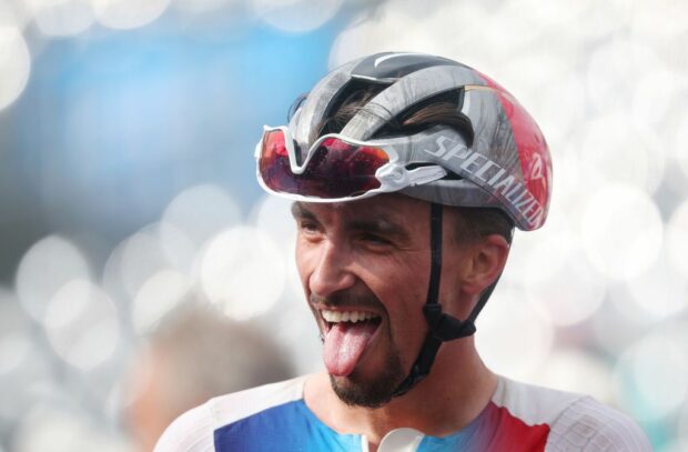 PARIS FRANCE AUGUST 03 Julian Alaphilippe of Team France celebrates the victory of his teammates Valentin Madouas as Silver medal and Christophe Laporte as Bronze medal during the Mens Road Race on day eight of the Olympic Games Paris 2024 at trocadero on August 03 2024 in Paris France Photo by Jared C TiltonGetty Images