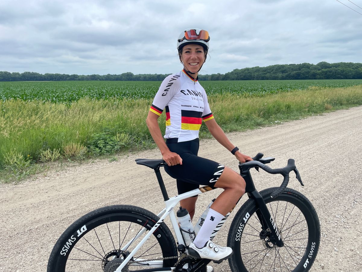 Carolin Schiff before a recon ride at the 2024 Unbound Gravel 200 in the German national champion's kit