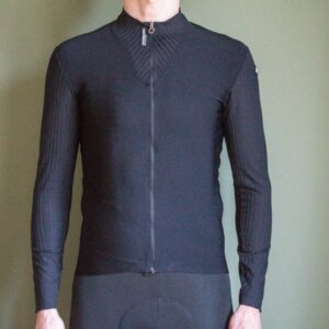 A male cyclist wearing a bloack Thermobooster base layer