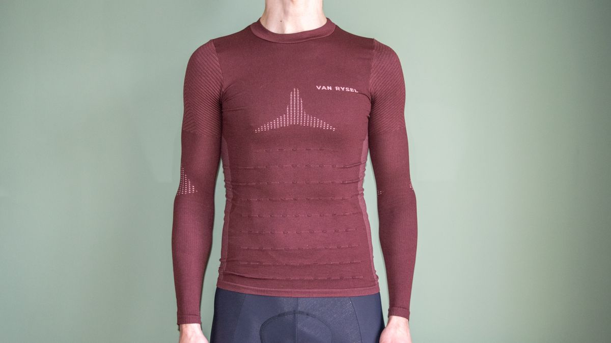 A man wearing the Van Rysel Long Sleeve Racer 2 base layer