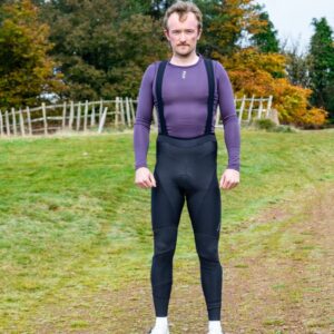 A man wearing a pair of Van Rysel RCR bibtights